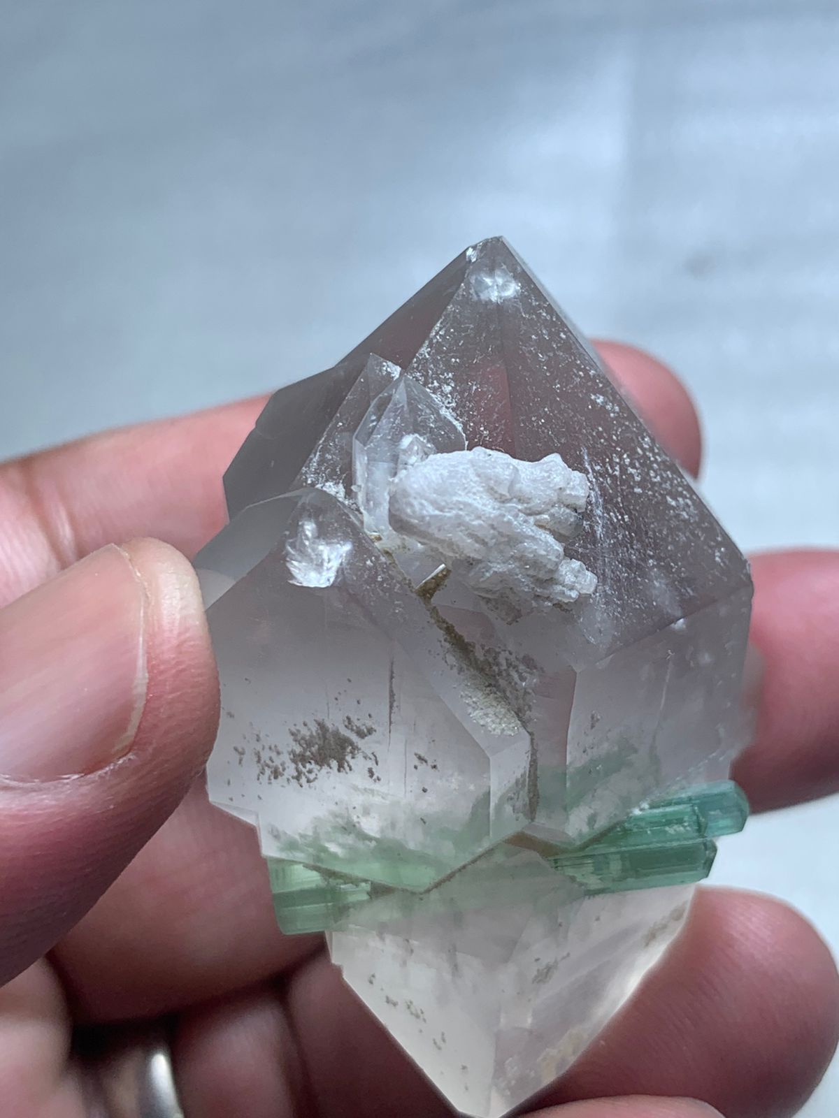 Smoky Quartz crystal point with Tourmaline inclusions