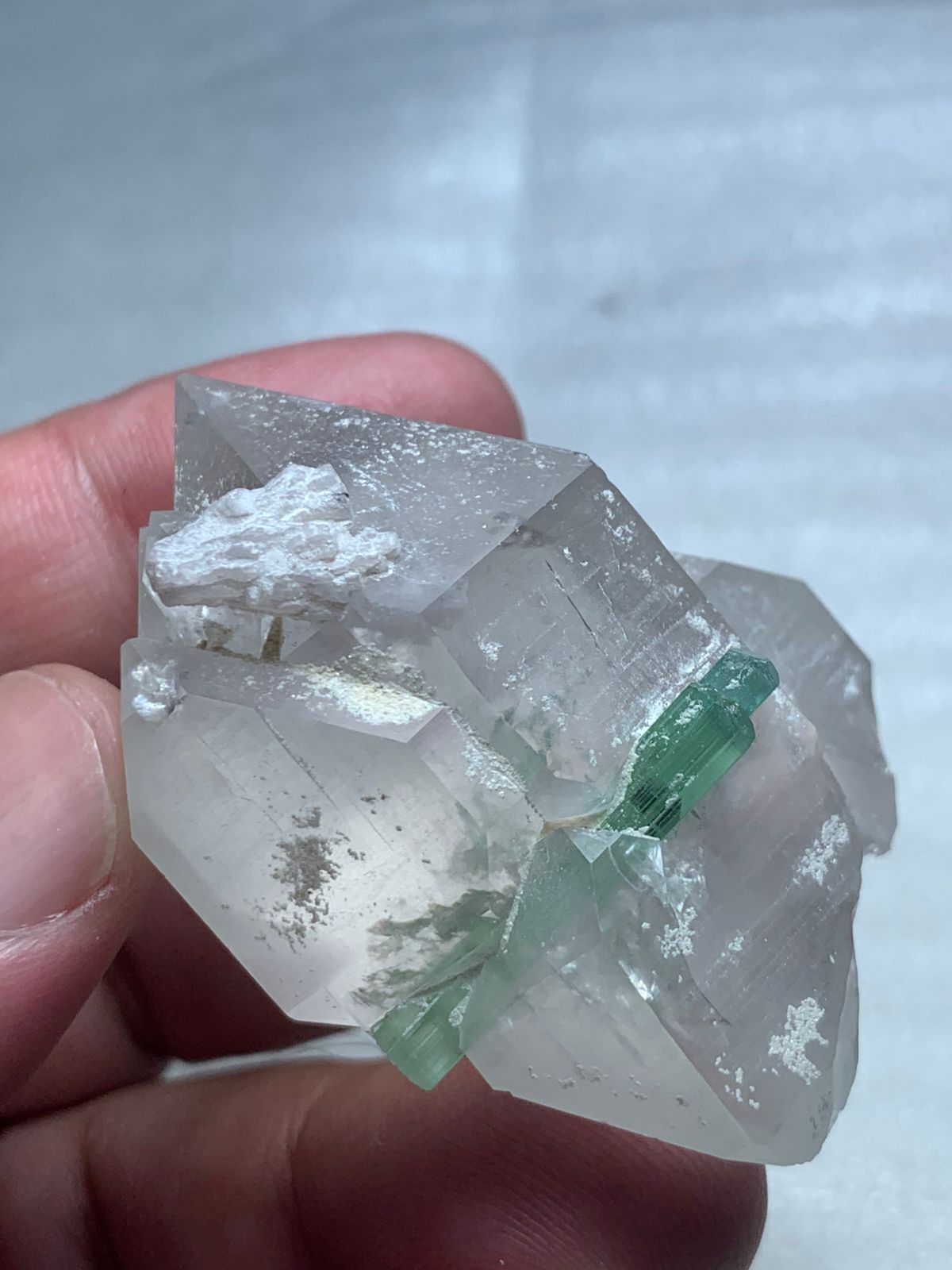 Smoky Quartz crystal point with Tourmaline inclusions